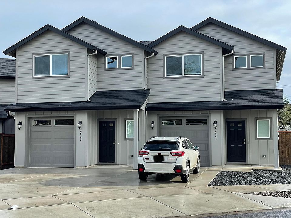 Front of duplex. Available unit is on left.