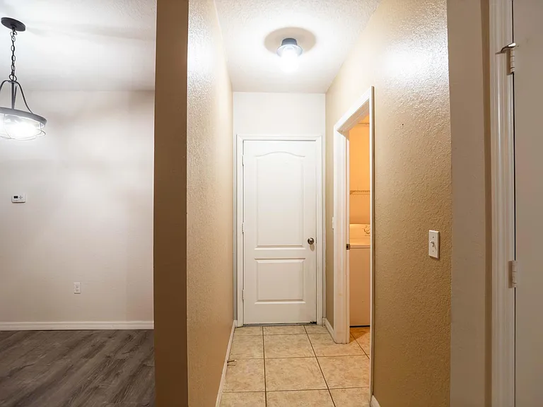 Hallway leading to Garage/ Laundry room