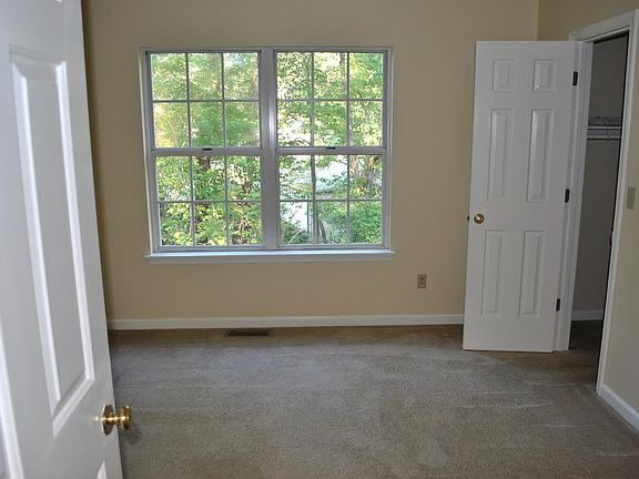 Bedroom with walk-in closet
