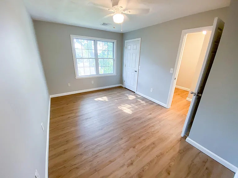 The view of the second bedroom without furniture.