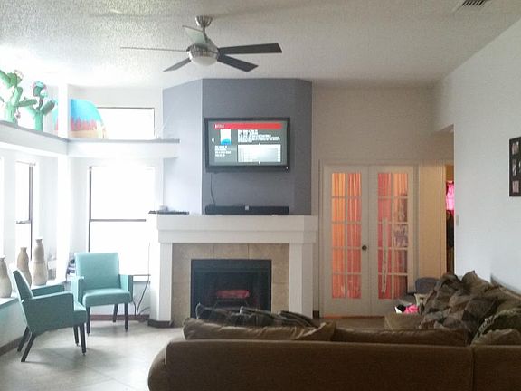 Living Room with fireplace & bay windows