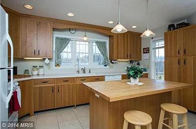 Quality Tile Floors & Custom Cabinets!