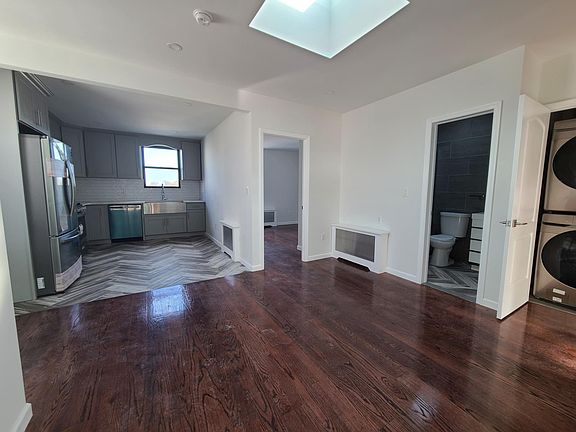 Kitchen/living room/ door to 2nd bdrm, washer dryer
