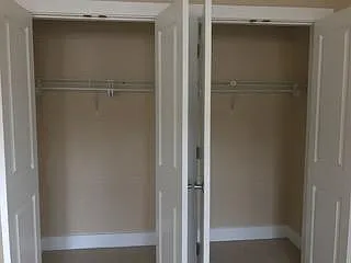Wall of closets in the bedroom