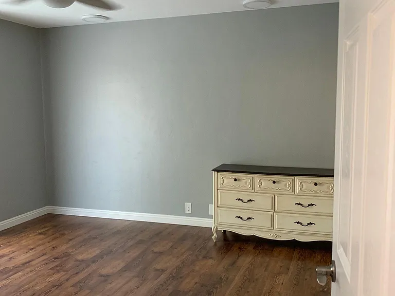 Very large master bedroom. Dresser is in the garage now.