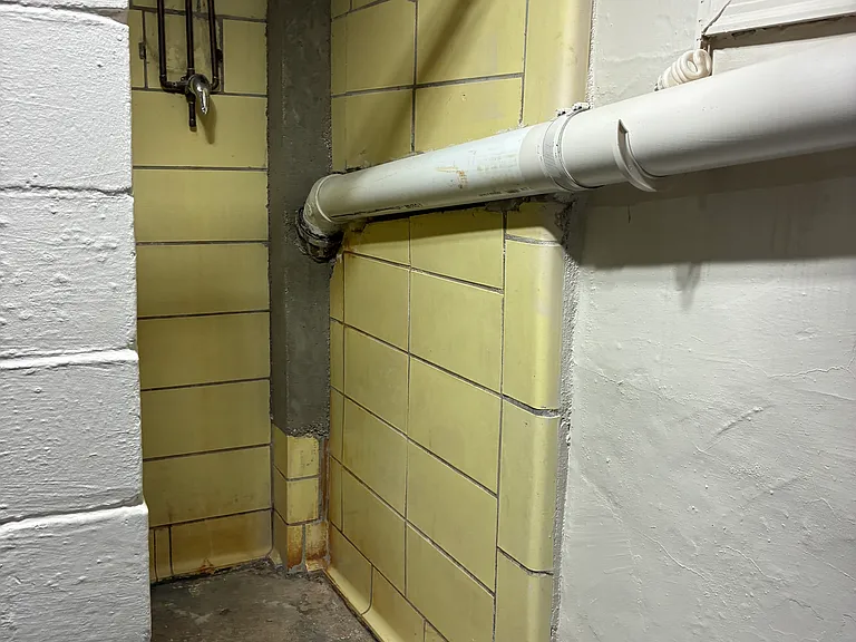 Shower in Laundry Mechanical room off kitchen