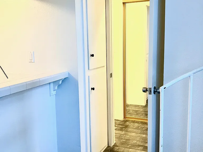 Currently throughout the downstairs new flooring & baseboards are being installed.