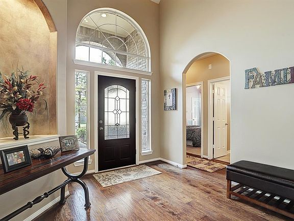 Walk through the front door into the 2 story entryway. To the left of the front door are three bedrooms and a full bath.