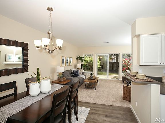 Totally Updated: New Floors & Carpet, Fresh Paint, Quartz Counters, Breakfast Bar, Lighting, Appliances, etc, Etc, ETC!