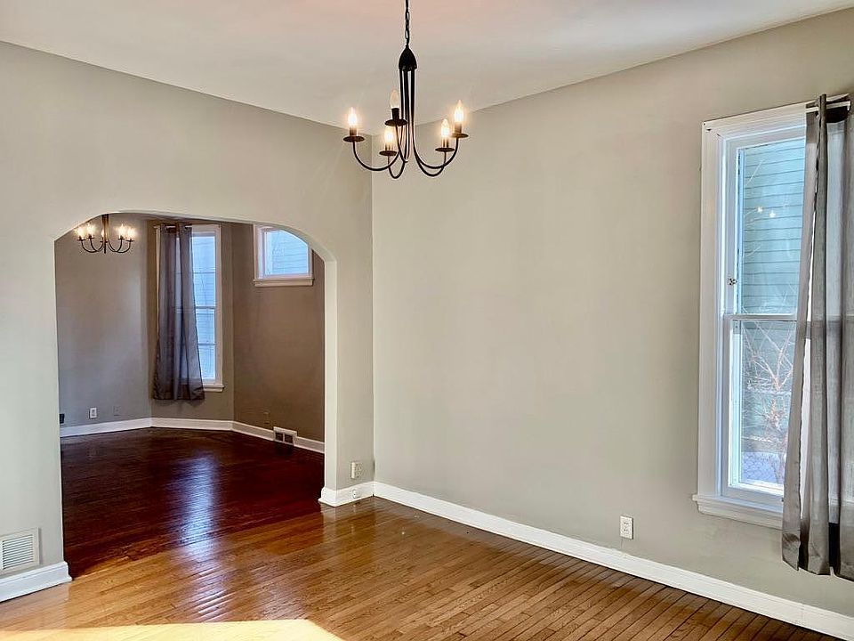 Welcome home! Entering into the Living room of this gorgeously remodeled 2 bed 1 bath unit. 10 foot ceilings, gleaming hardwood floors, all new paint & window treatments.