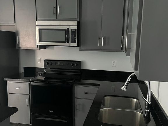 Modern kitchen design furnished with brand new appliances