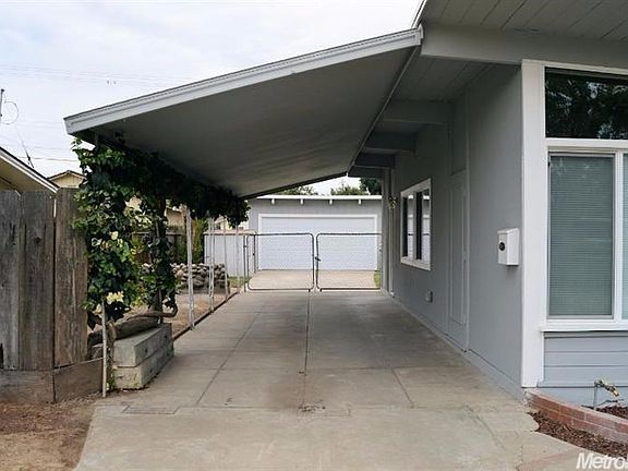 Could be used as a carport or covered patio area