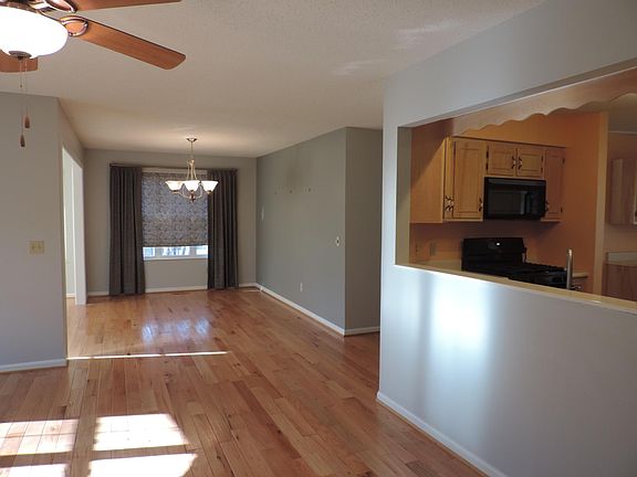 Straight ahead dining section. To the right is the kitchen.