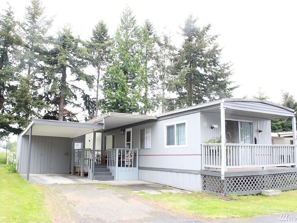 Welcome Home to this home backed up with a beautiful backdrop setting. Double storage sheds, sun deck, covered patio, and easy maintenance backyard.