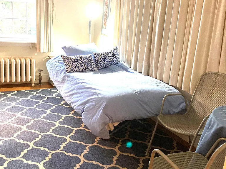 Bedroom with full closet