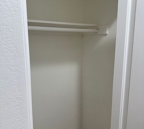 Second coat closet provides additional storage.
