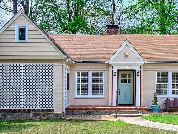 View of front of house, prior to new roof.