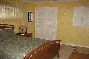Master bed w/ two closets