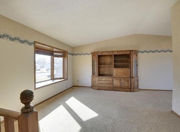 Living room is vaulted and has a fabulous bay window bringing the sunshine in