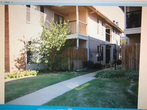 Fenced in patio and front entry gate