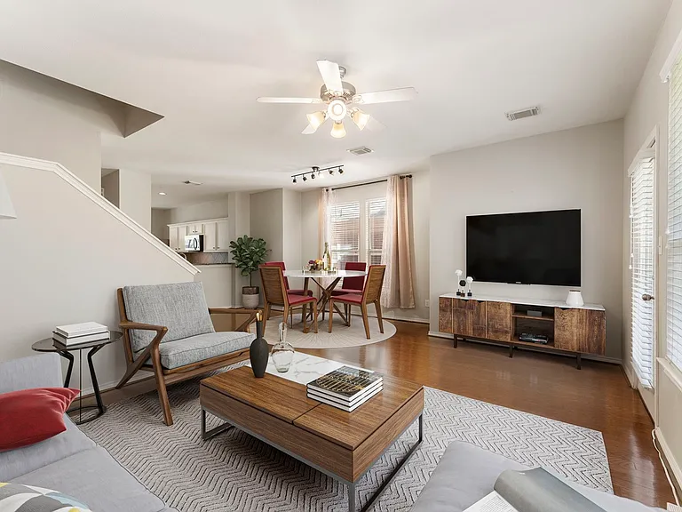 Shared second floor living space. Furnishings are staged.
