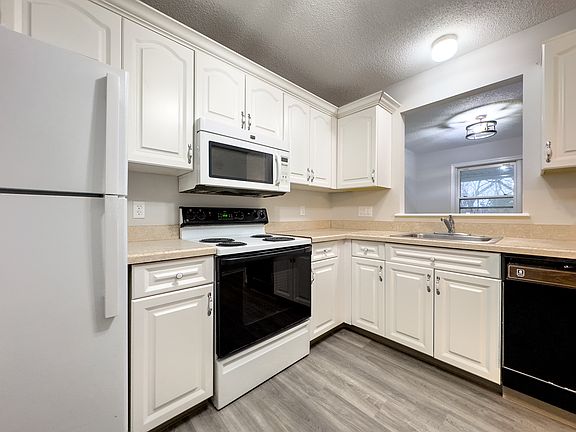 Kitchen with opening to dinning room.