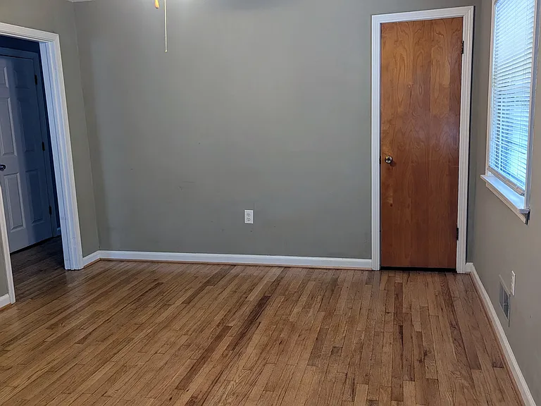 The dining area is part of the kitchen with a pantry area giving additional storage.