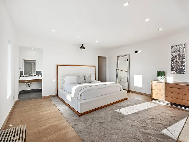 Indulge in luxury in our extra dwelling unit, featuring a king-size bed, Smart TV, and ensuite bath for the ultimate comfort.