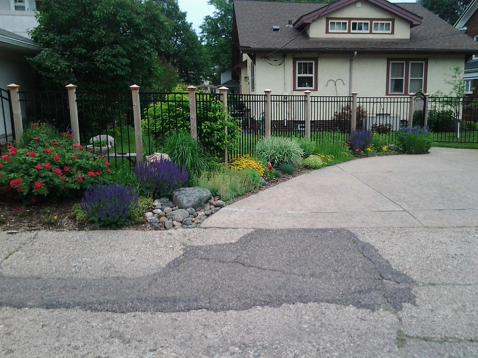 From alley, driveway on  rt