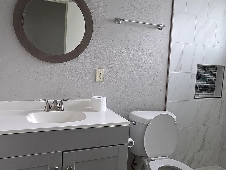 This is the primary bathroom connected to the main bedroom.