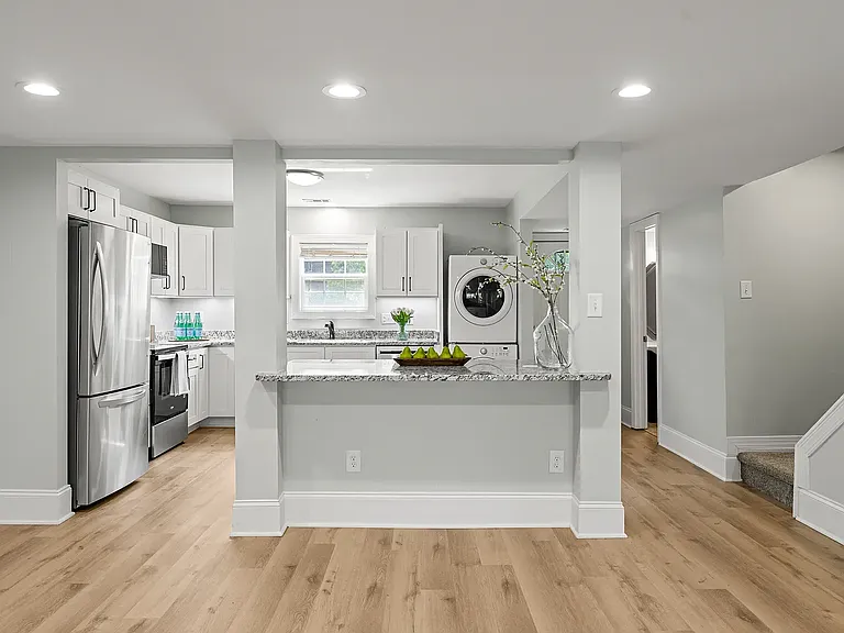 Kitchen and stairs to 2nd floor