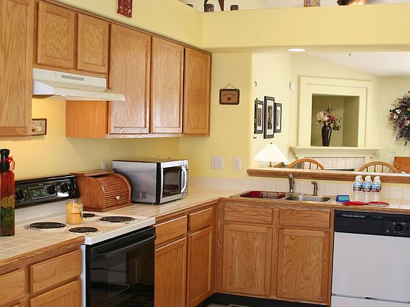 Kitchen Flows Into Vaulted Living Room!