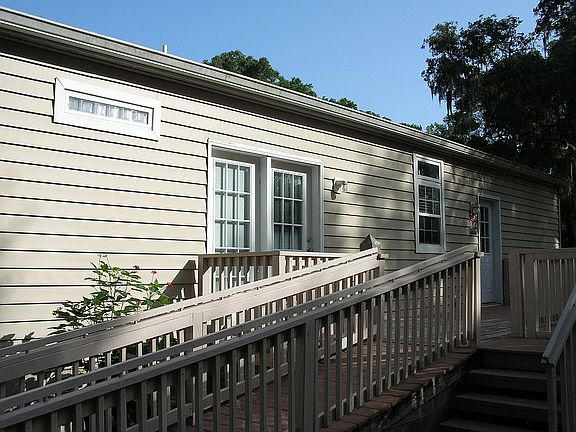 Back of home with ramp.