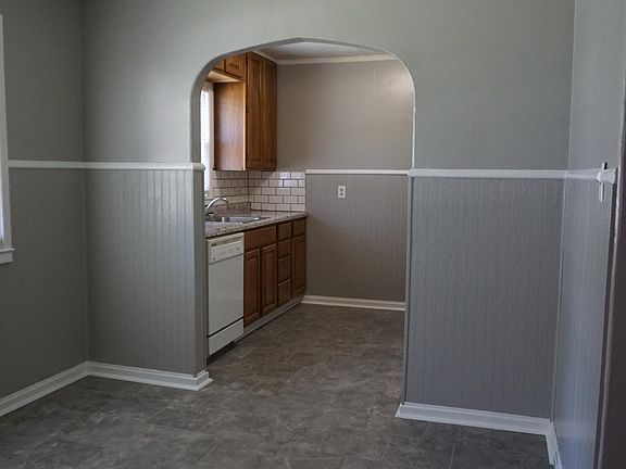 Dining room leading into kitchen