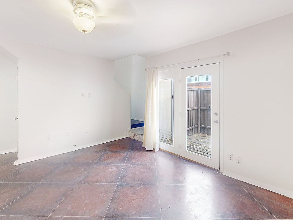 Living & French doors to private patio, floors have been polished since this photo