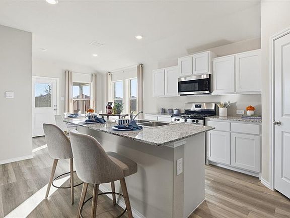 Kitchen-All Home and community information, including pricing, included features, terms, availability and amenities, are subject to change at any time without notice or obligation. All Drawings, pictures, photographs, video, square footages, floor plans, elevations, features, colors and sizes are approximate for illustration purposes only and will vary from the homes as built.
