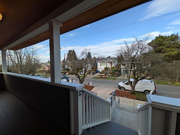 Craftsman inspired stairs and covered porch.