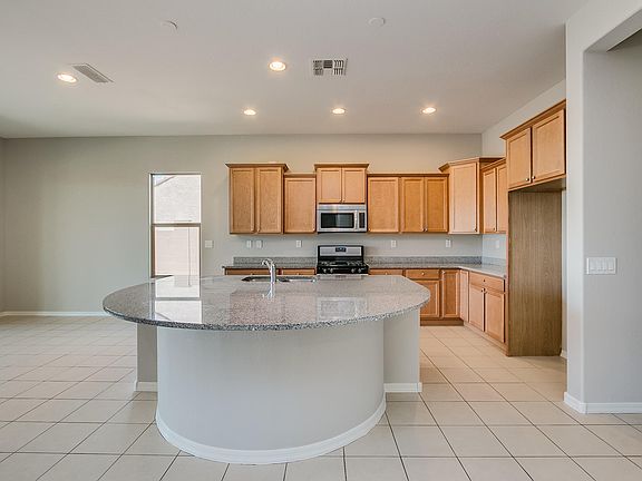 3rd image of 5845 E Bramble Berry Ln