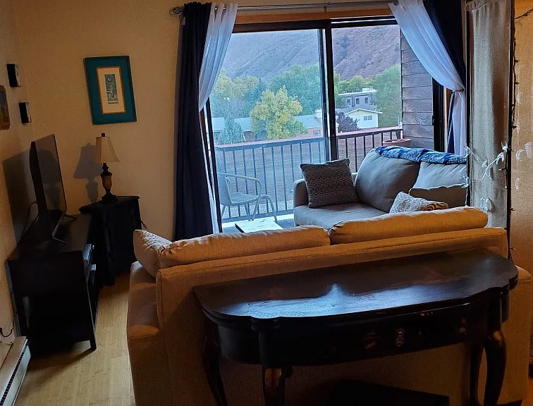 Living room with a walk-out balcony