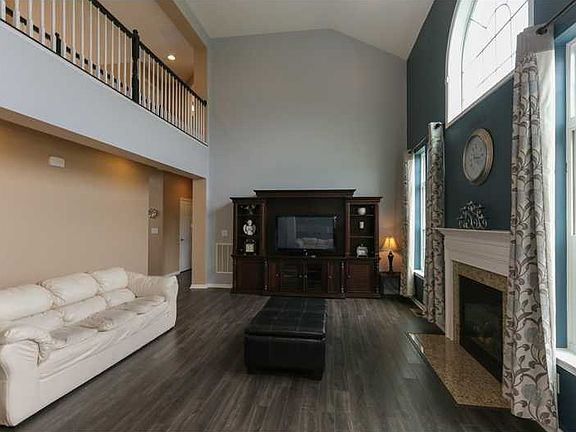 Family Room. Gas fire place w/granite frame. Built in media cables.