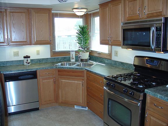 Remodeled kitchen with stainless steel appliances