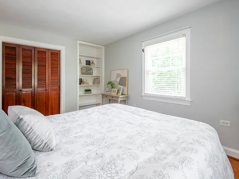 2nd bedroom upstairs with built-in bookcase