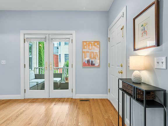 Rear entrance, private deck, and courtyard