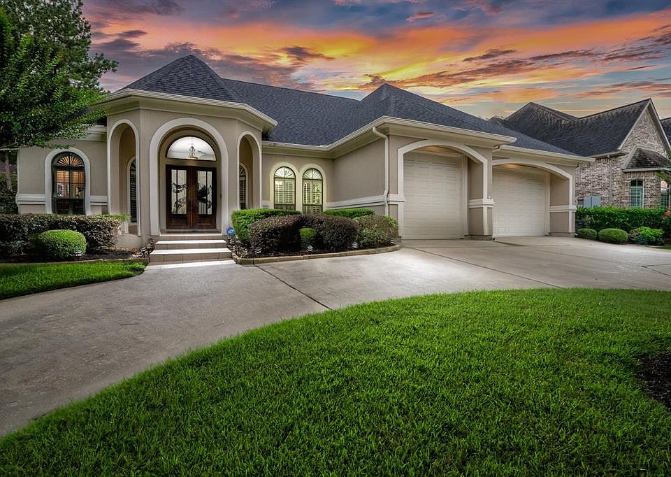 Gorgeous custom one story located in prestigious Champion Forest on a cul-de-sac street.
