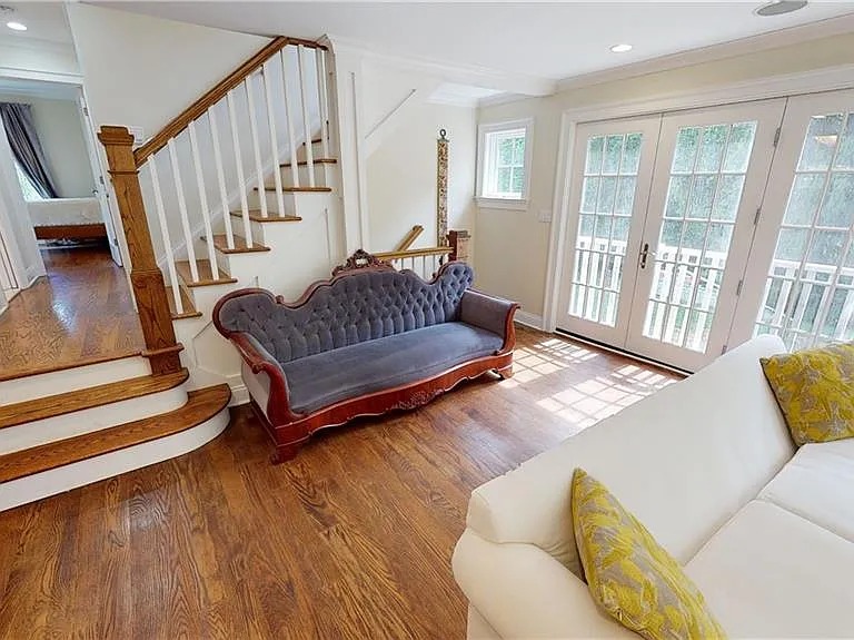 Beautiful wood work throughout home. Thoughtfully designed staircase separates living and sleeping areas