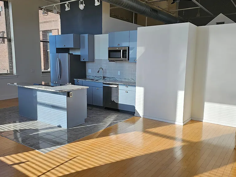 Helix Realty- The Original SOHO LOFTS — Photo 13