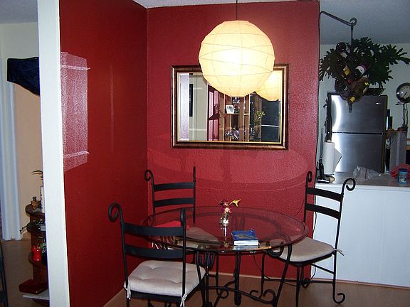Looking from living room towards kitchen (hallway to bedrooms on left) 