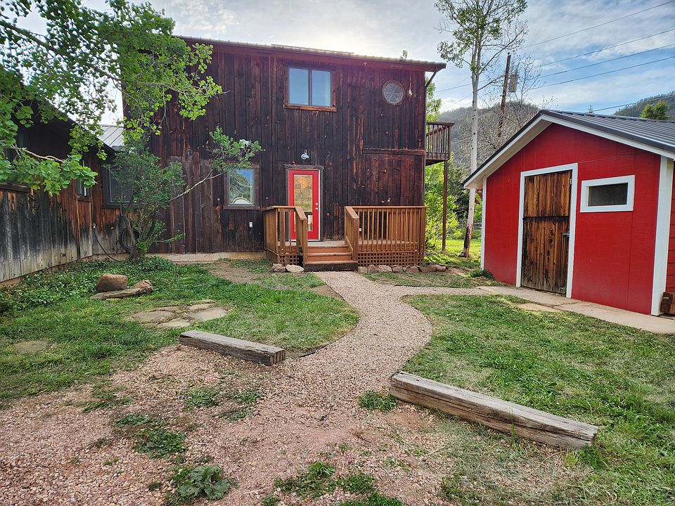 The whole back house is yours! Private off street parking, mountain views. Cute deck. (Shed not included)