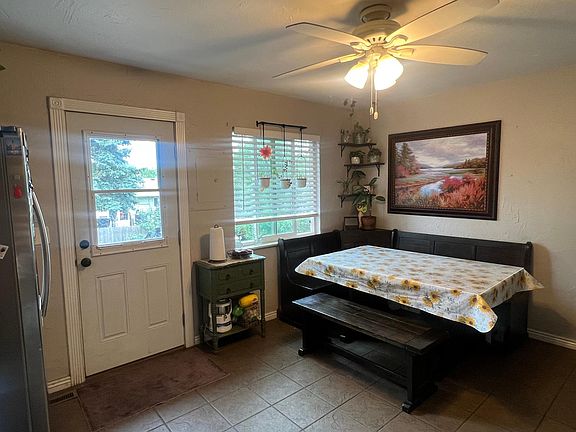Kitchen Table and Back Door to Back Yard
