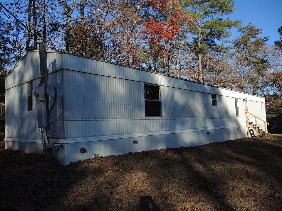 16X80 on a half acre.